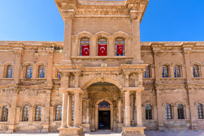 Low angle view of historical building against clear sky