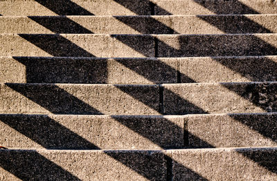 High angle view of shadow on concrete floor