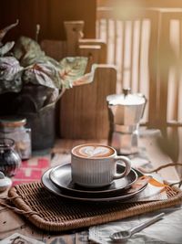 A cup of coffee on the table. conceptual stilllife with morning vibes concept