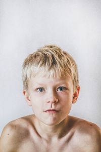 Portrait of cute girl over white background