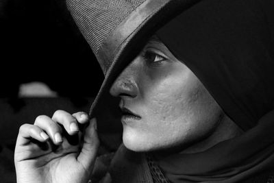 Close-up of woman hand holding cigarette