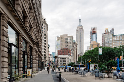 Buildings in city against sky