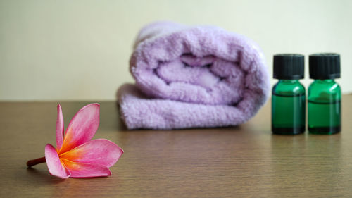 Close-up of pink flower on table