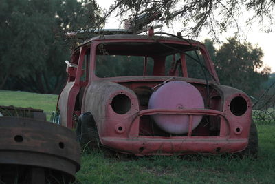 Abandoned truck on field