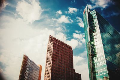 Low angle view of modern buildings against sky