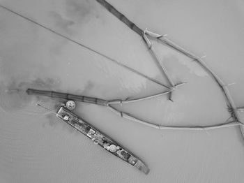 High angle view of fishing boat on sea during winter