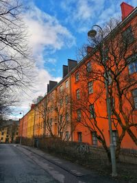 Street amidst buildings against sky