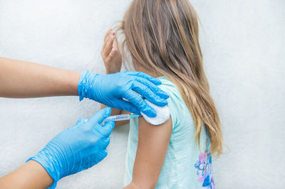 Cropped image of woman holding hair