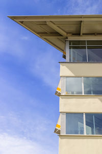 Modern office building with a blue sky