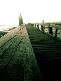 Pier on sea against sky