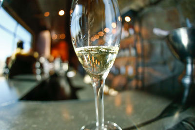 Close-up of wineglass on table at restaurant