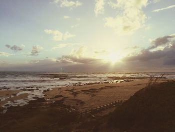 Scenic view of sea at sunset