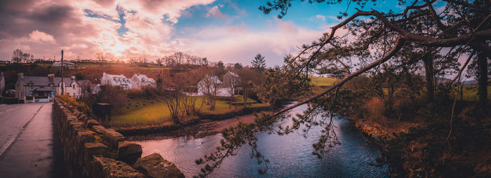 Beautiful panoramic view of cushendun's glendun river from over the bridge during sunset