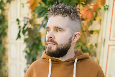 Portrait of young man looking away