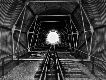 Railroad tracks in tunnel