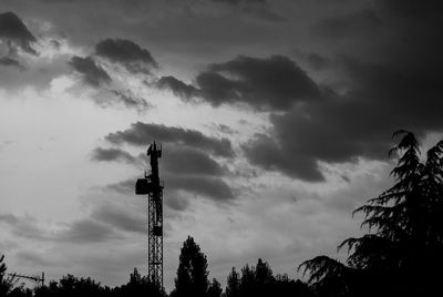 Low angle view of silhouette trees against sky during sunset