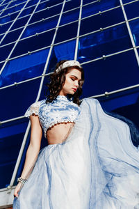 Young woman posing outdoors