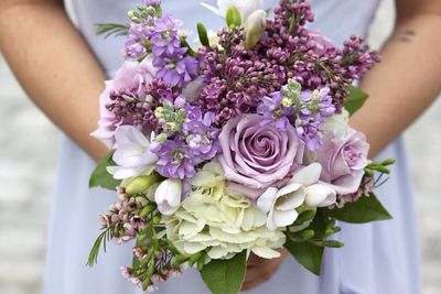 Close-up of woman holding bouquet