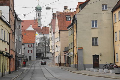 Road amidst buildings in city