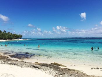 Scenic view of sea against blue sky