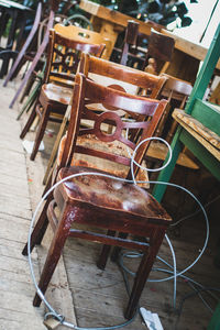 Close-up of empty chairs and table