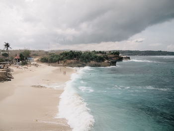 Scenic view of beach against sky