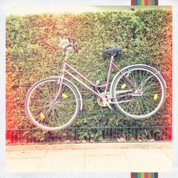 Bicycle parked in grass