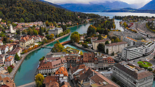 High angle view of river amidst buildings in city