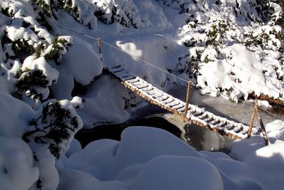 High angle view of snow covered cars on snowcapped mountains