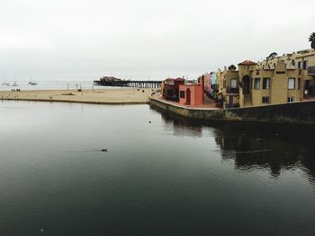 View of river with buildings in background