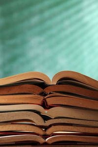 Close-up of books against wall