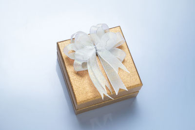 High angle view of paper box against white background