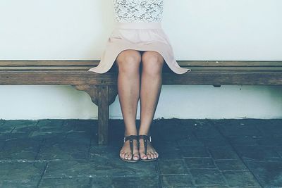 Low section of woman standing on floor