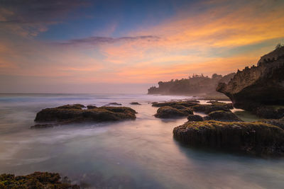 Scenic view of sea against sky during sunset