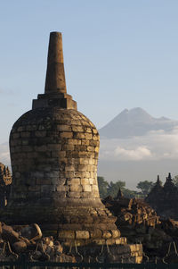 Ancient temple against sky