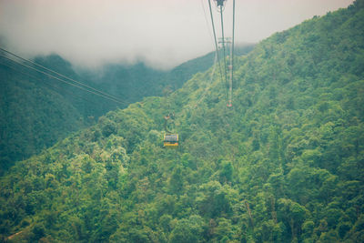 Overhead cable car over mountains