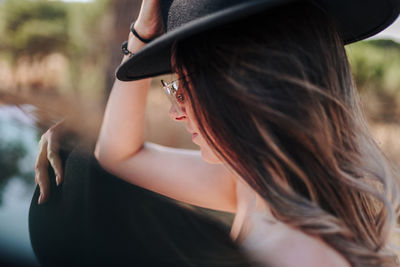 Portrait of woman wearing hat