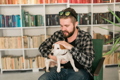 Man with dog at home