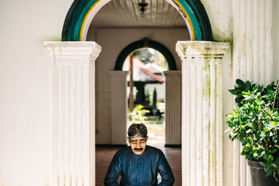 Statue in front of building