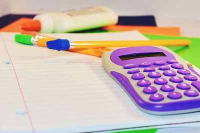 Close-up of multi colored pencils on table