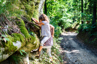 Sisters in forest