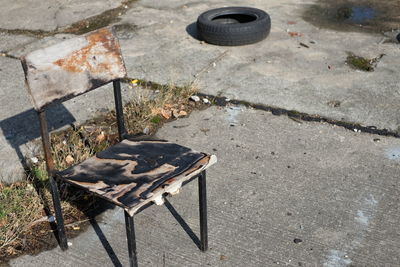 High angle view of burnt chair