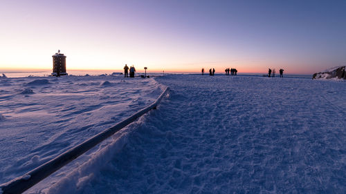 Scenic view of sea against clear sky during sunset