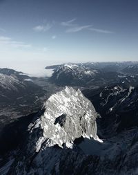 Scenic view of snow mountains against sky