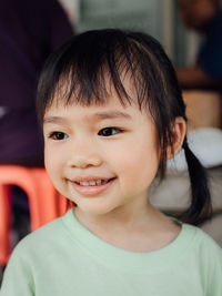 Close-up portrait of smiling boy