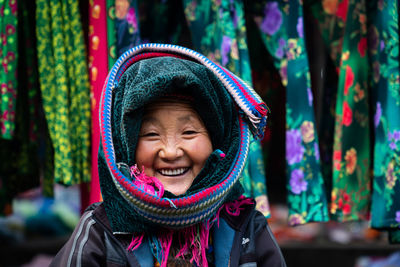 Portrait of smiling woman in hat