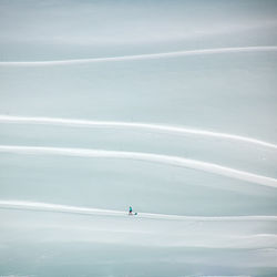 High angle view of person by sea against sky