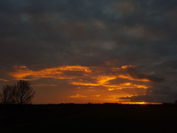 Scenic view of dramatic sky during sunset