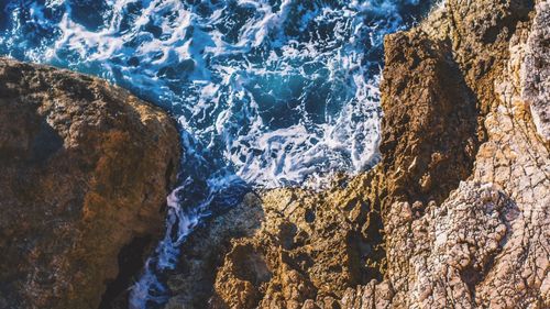 Close-up of rock formation in sea