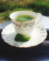 Close-up of tea cup on table